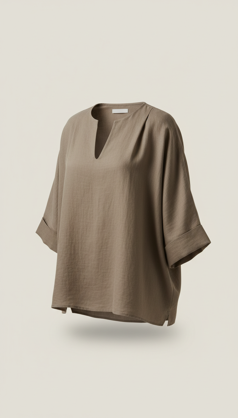 Capture an Earthy Taupe blouse at a 3/4 angle, perfectly centered against a neutral Soft Ecru background. The lighting is...